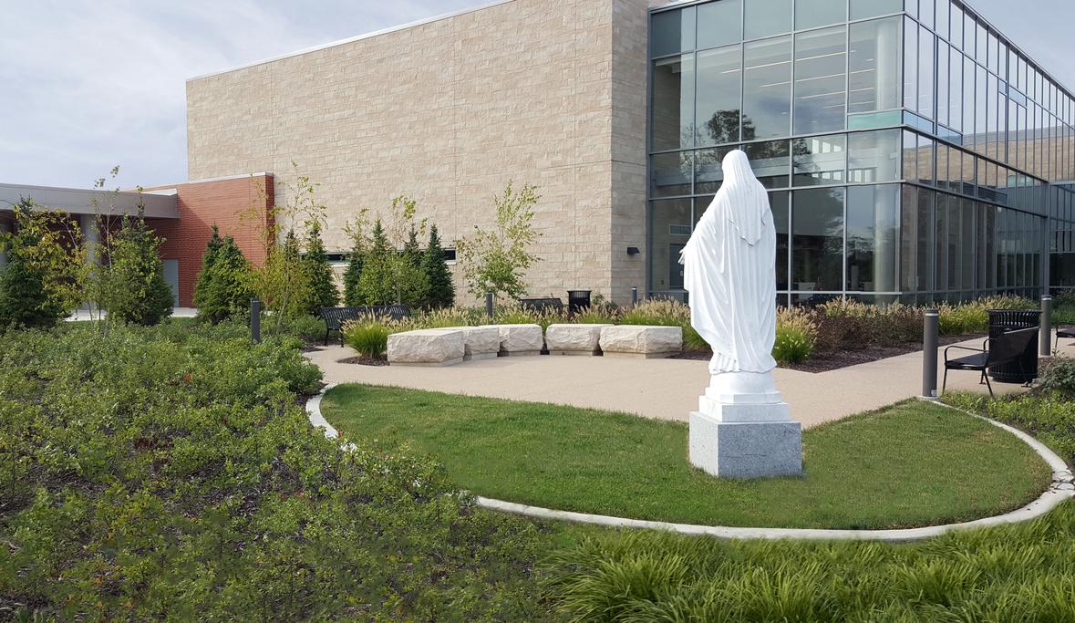 reflective statue and outdoor space for health and wellness