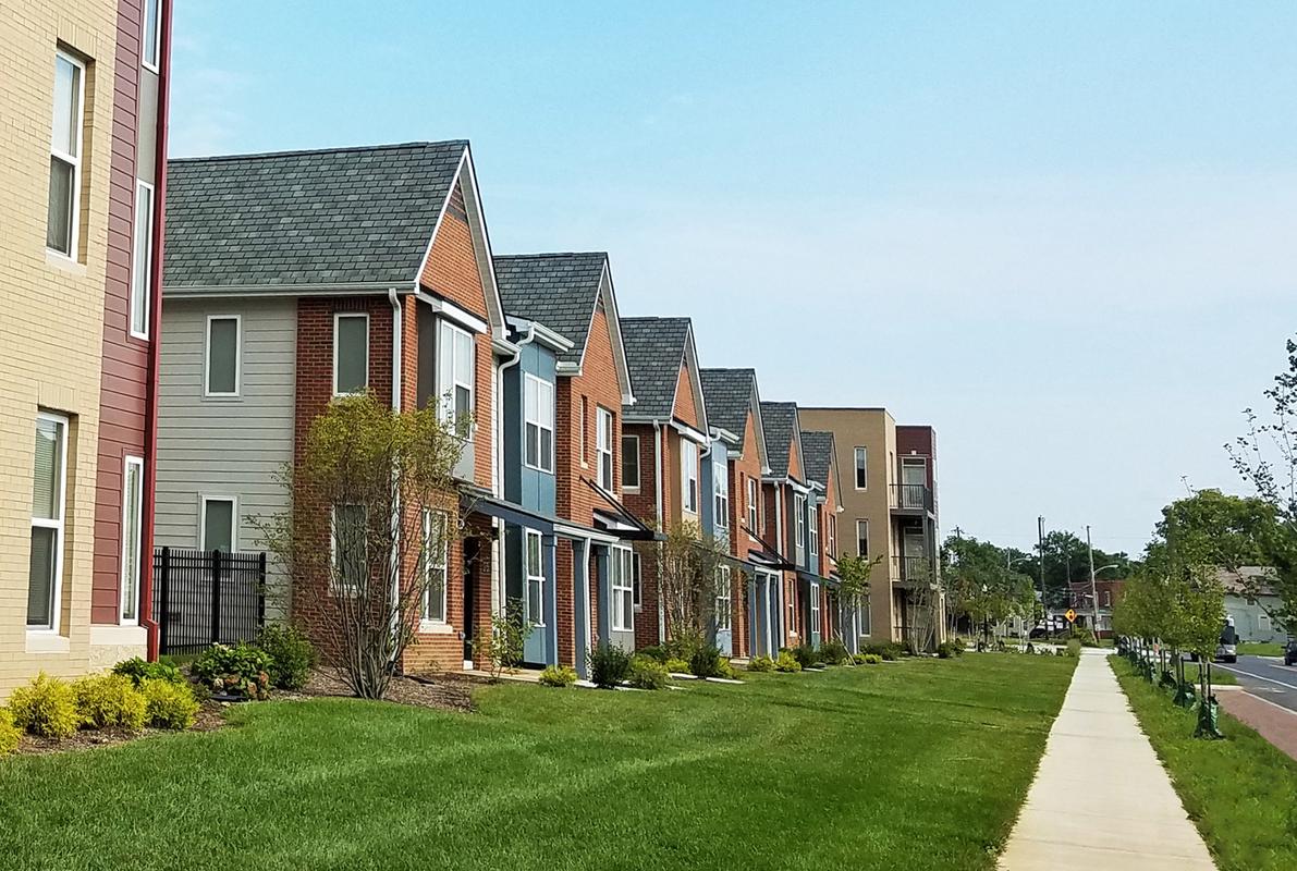 yards and sidewalk in a residential neighborhood