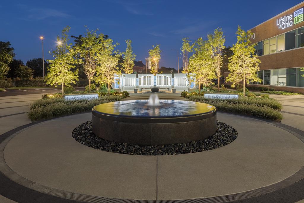 Lifeline of Ohio memorial fountain at night.